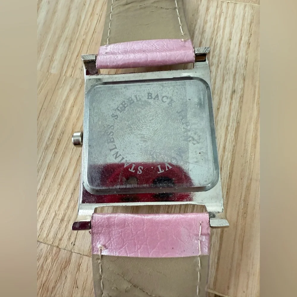 Unbranded ladies rectangular silver tone Christian angels pink watch NEW BATTERY